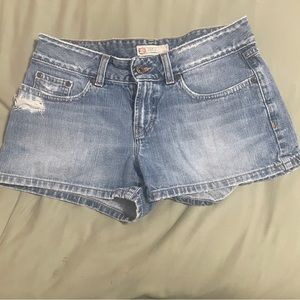 Buckle distressed jean shorts